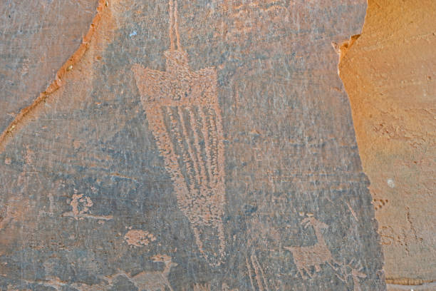 istock Rock art symbol from ancient man. 1093705662