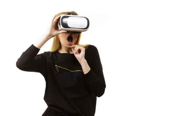 istock Woman wearing VR goggles 1093711184