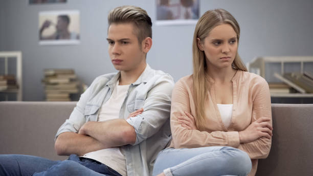 istock Girlfriend feeling offended and hurt, waiting for boyfriend apologize, conflict 1093727102