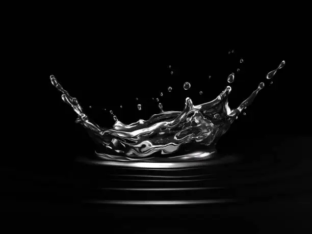 Photo of Water crown splash. On black background. Side view.