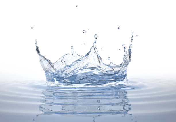istock Water crown splash in a water pool, with circular ripples around. 1093730718