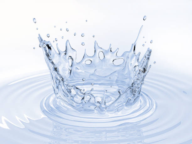 istock Water crown splash in a water pool, with circular ripples around. 1093730774