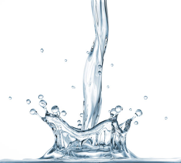 Pouring water with crown splash. Close up. Pouring water with crown splash. Close up. Side view on white background. pour water stock pictures, royalty-free photos & images