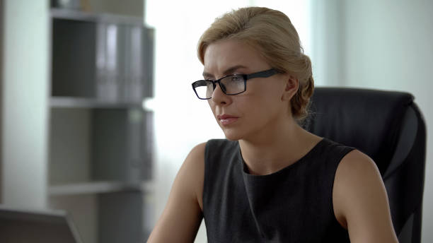 istock Middle-aged business lady working on important project, preparing presentation 1093736618