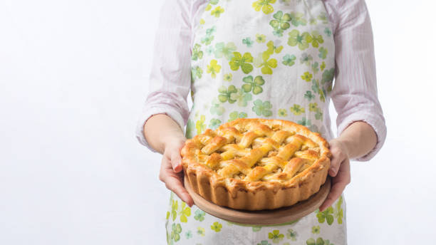 Apple pie with lattice pastry, traditional pastry dessert for Thanksgiving day, autumn baking concept, top view