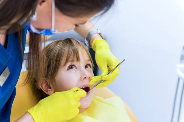 istock Cute girl teeth checkup at dentist's office 1093741146
