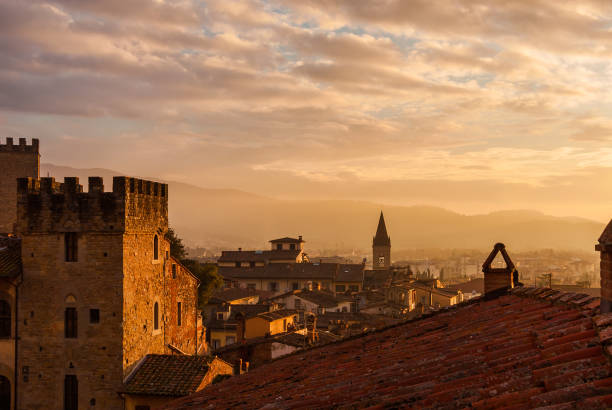 Arezzo sunset skyline with ancient buildings stock photo