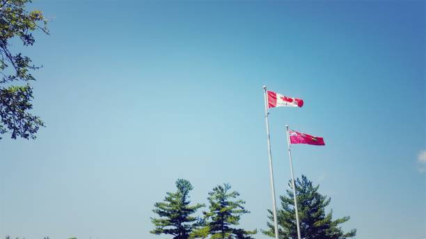 istock Ontario and Canadian flags (photo2) 1093760742
