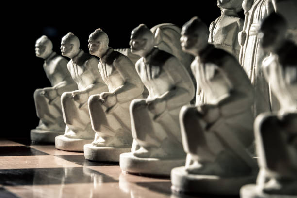 istock Chess board. Beautiful white hand-made pawns among allied chess 1093761084