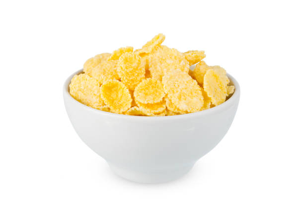 istock Corn flakes in a bowl isolated on white background 1093770912