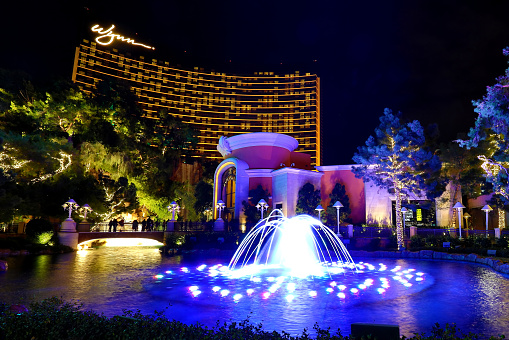 Las Vegas, Nevada, United States - December 31, 2018. Music water fountain at Wynn Las Vegas with changing colors on New Year's Eve.