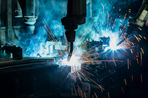 istock Team industrial robot are welding in factory 1093785306