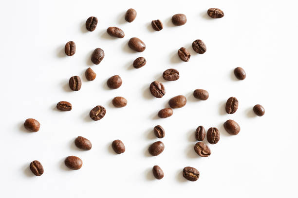 istock Roasted coffee beans isolated on white background. Close up. 1093802110