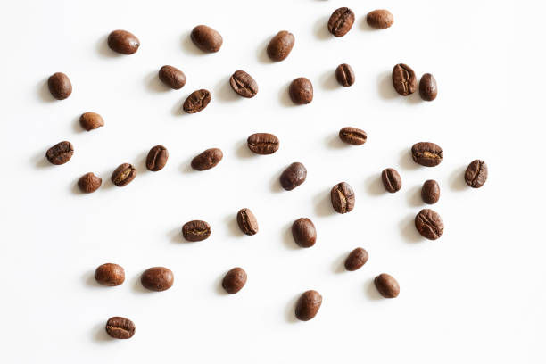 istock Roasted coffee beans isolated on white background. Close up. 1093802122