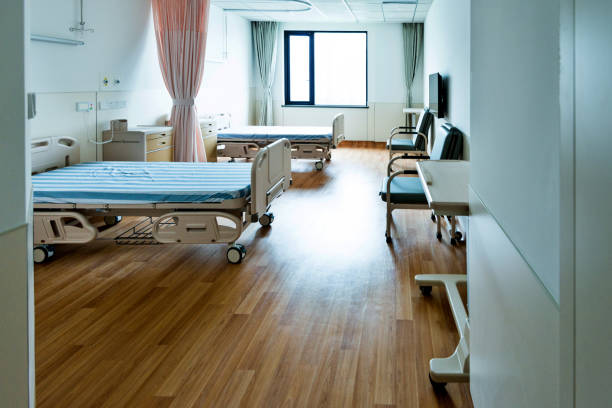 istock Hospital ward with beds and armchairs 1093840460