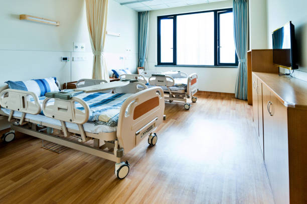 istock Hospital ward with beds and armchairs 1093840476