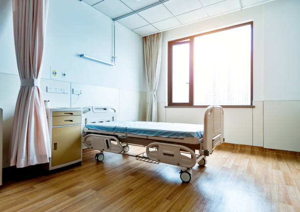 istock Hospital ward with bed and table 1093840590