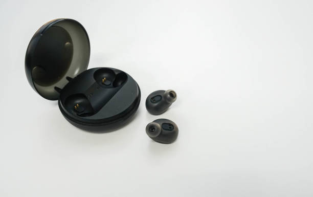 istock isolated modren portable wireless bluetooth earbuds with trendy case 1093842334