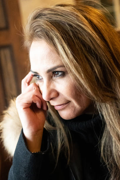 istock Pensive mature woman looking away 1093844844