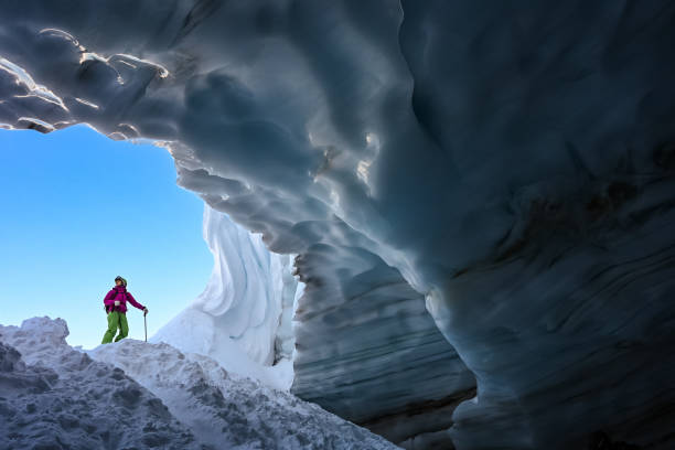 istock Back country skier exploring a glacial ice cave 1093855772