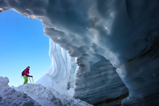 istock Back country skier exploring a glacial ice cave 1093855788