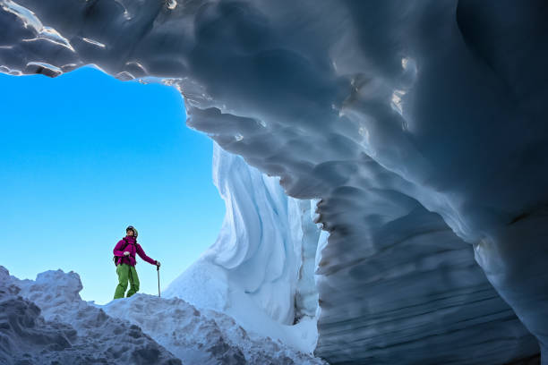istock Back country skier exploring a glacial ice cave 1093855794