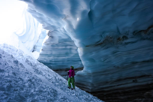 istock Back country skier exploring a glacial ice cave 1093855852