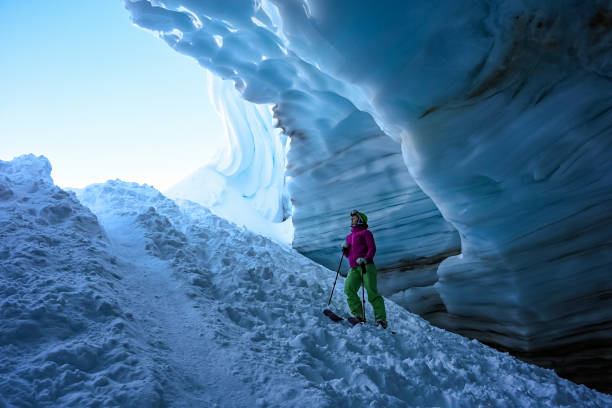 istock Back country skier exploring a glacial ice cave 1093855856