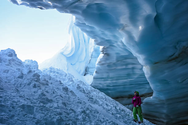 istock Back country skier exploring a glacial ice cave 1093855884