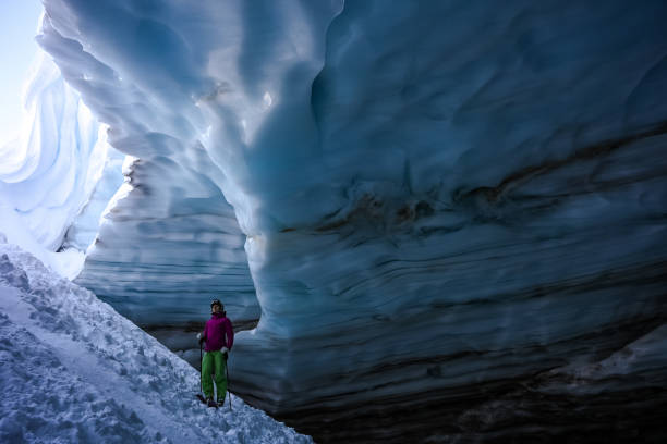 istock Back country skier exploring a glacial ice cave 1093855904
