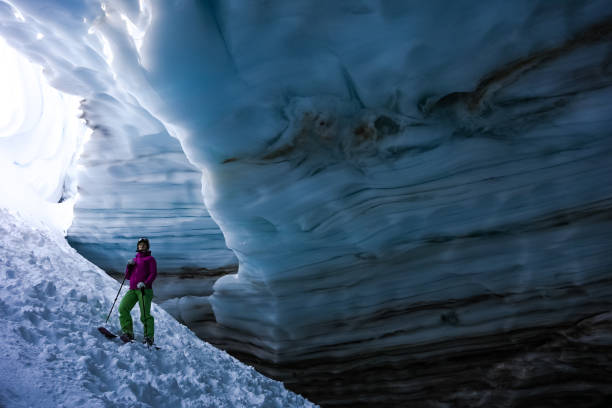 istock Back country skier exploring a glacial ice cave 1093855924