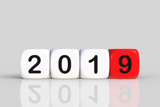 istock Christmas and Happy New Year 2019 concept with dice, 3D rendering isolated on white background. 1093860168