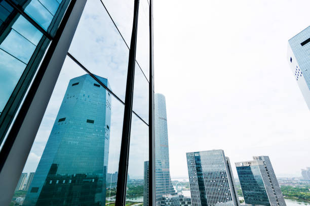 istock Skyscrapers are reflected on glass walls 1093867316