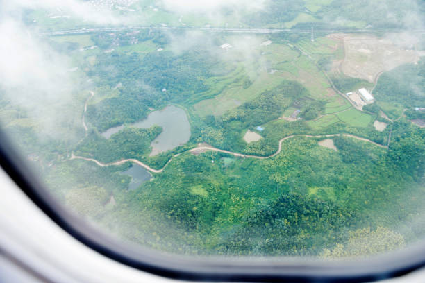 Aerial view of fields and village.