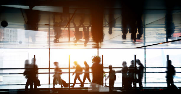 istock Crowd of passengers walking on station platform 1093872140