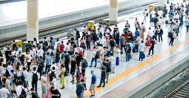 istock Crowd of passengers waiting on station platform 1093872386