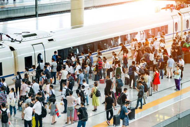 istock Crowd of passengers waiting on station platform 1093872462