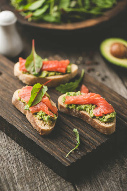 istock Healthy Open Sandwiches With Avocado and Salmon 1093875658