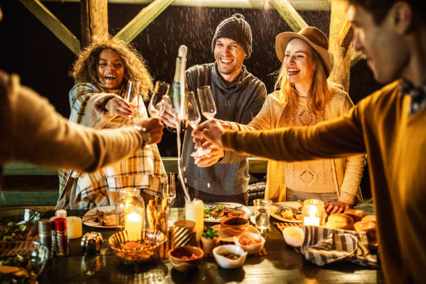 istock Champagne splashing at dinner party! 1093880272