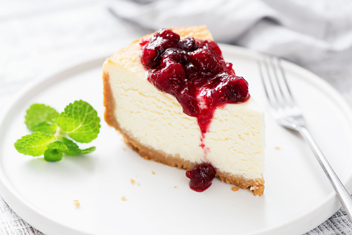 Classic Cheesecake With Cherry Sauce On White Plate. Tasty Delicious Dessert Cream Cake