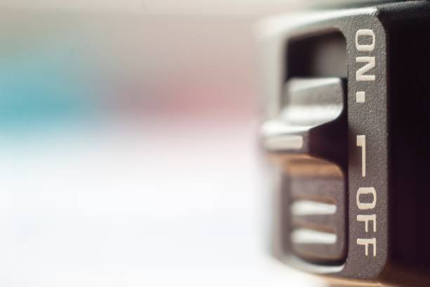istock Close-up of little On/Off switch with soft blurred background 1093881154