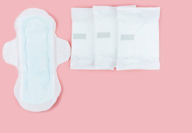 istock Sanitary pads and absorbent sheets on a pink background 1093882872