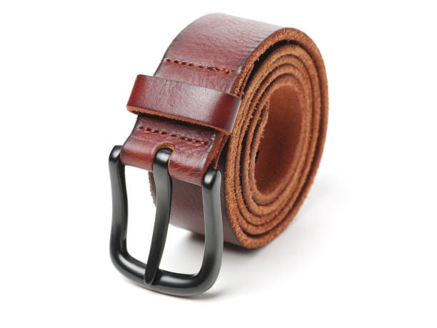 istock Brown leather belt, isolated on white background 1093885416
