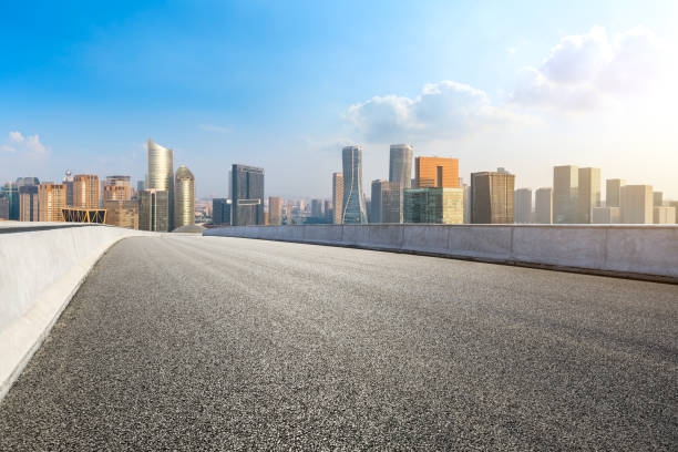 istock Asphalt road and city skyline in hangzhou,high angle view 1093885676