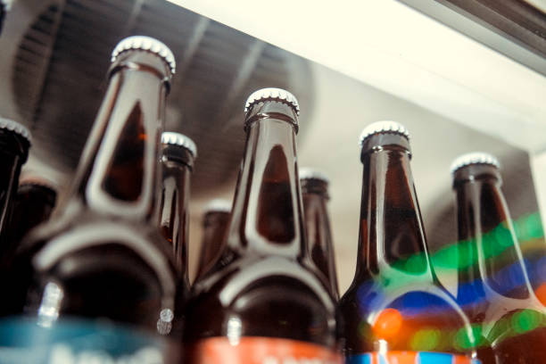 istock Beer bottles in ice cubes close up 1093886240