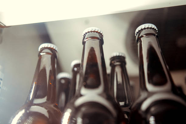 istock Beer bottles in ice cubes close up 1093886272