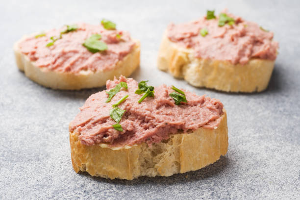 istock Sandwiches with chicken pate and butter on the table. 1093887644