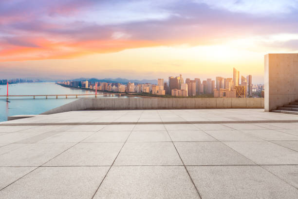 istock Empty floor and city skyline at sunrise in hangzhou 1093889058