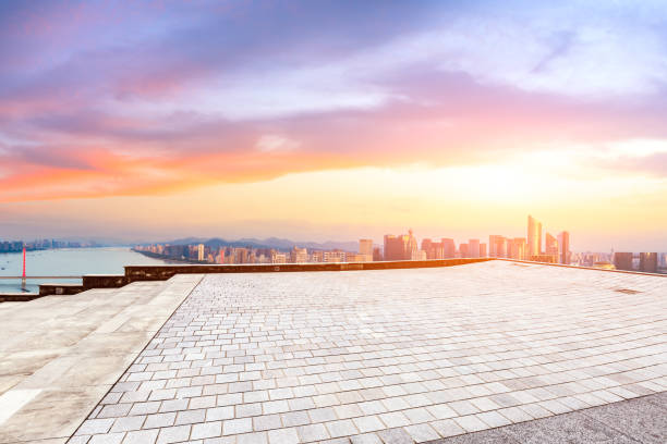 istock Empty floor and city skyline at sunrise in hangzhou 1093889074