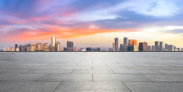 istock Empty floor and city skyline at sunrise in hangzhou 1093889200